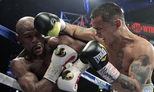 Floyd Mayweather and Marcos Maidana exchange punches in Las Vegas