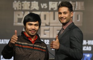450665-manny-pacquiao-l-from-the-philippines-and-chris-algieri-of-the-u-s-giv