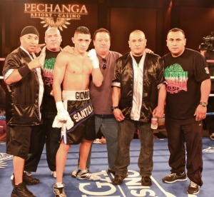 Giovani-Santillan-and-his-support-group-pose-for-a-photo-after-his-victory-in-his-pro-debut